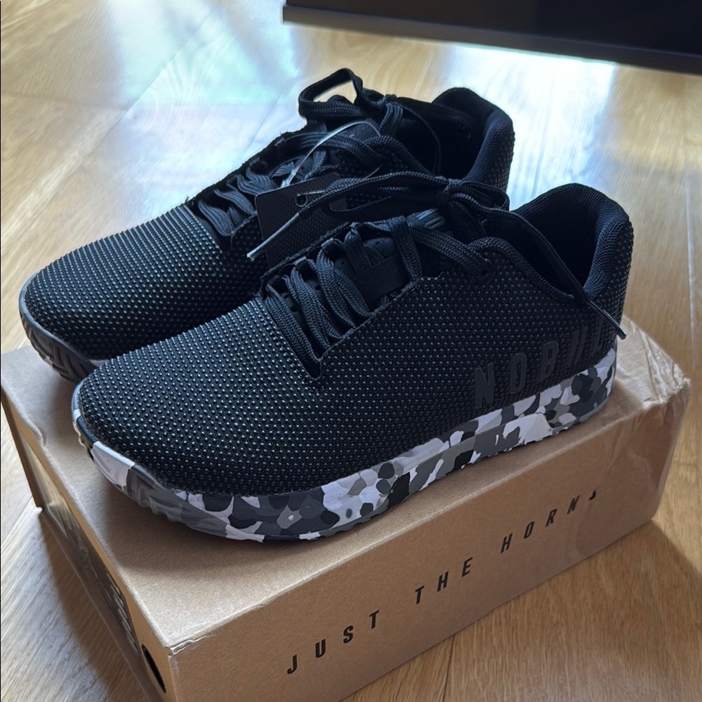Nobull black sneakers with camo sole